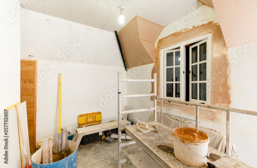 Plastering a room, plasterboard drywall installation in UK house photo