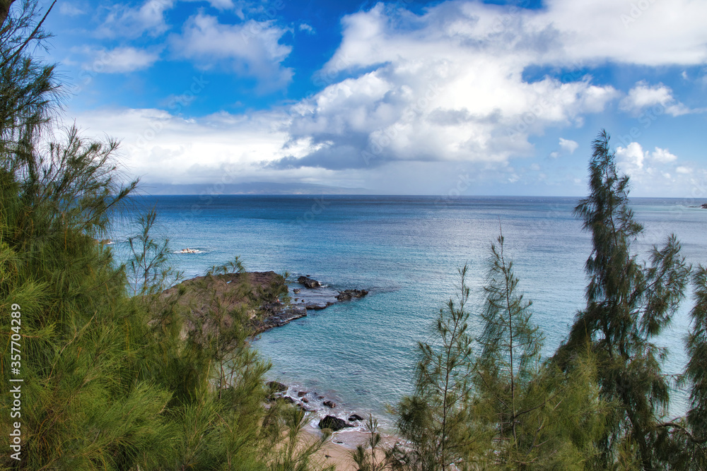 Stunning blue green ocean view of Honolua Bay on Maui.