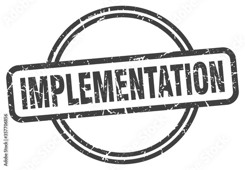 implementation grunge stamp. implementation round vintage stamp