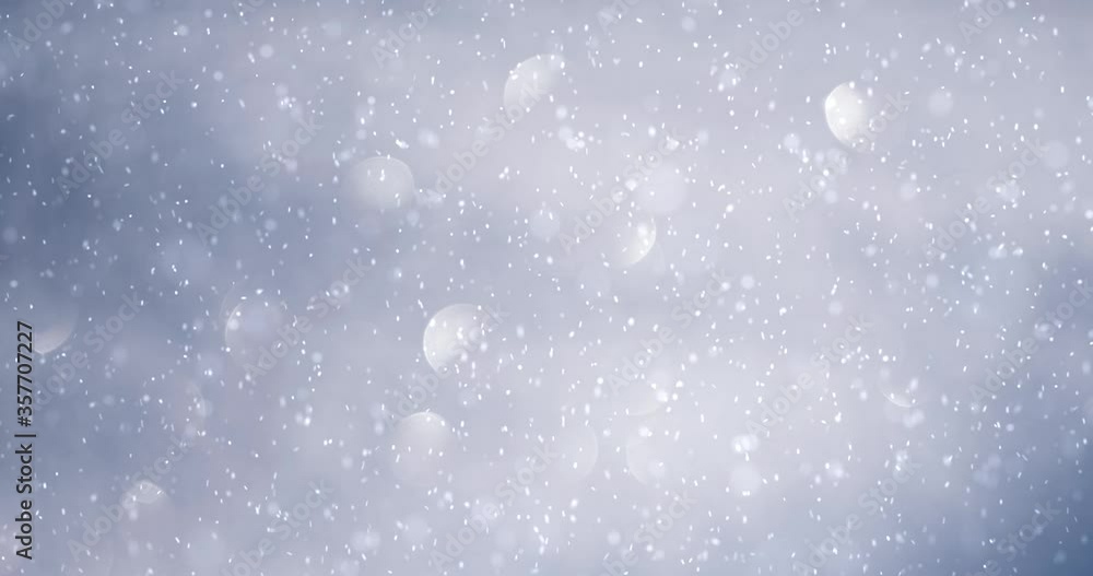 Realistic snowfall on abstract shining blue sky copy space background. Realistic snowfall on abstract shining blue sky copy space background.