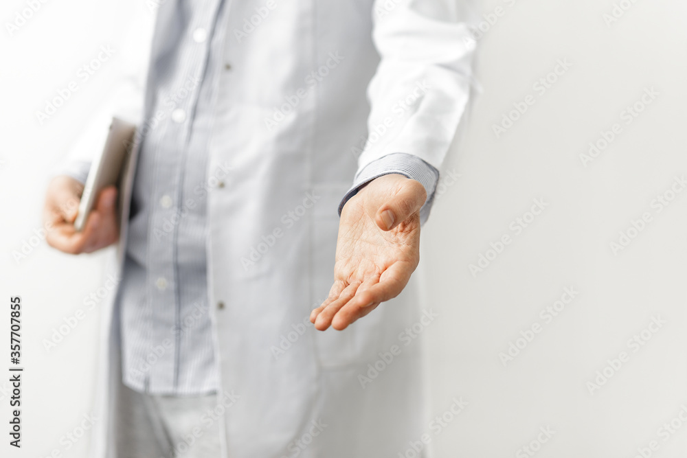 doctor offering helping hand on white background doctor offering helping hand on white background