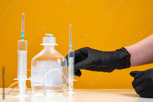 Human in gloves reaches for...