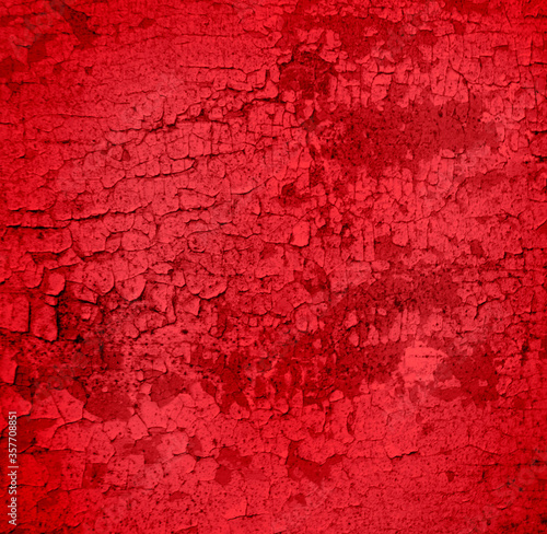 Cracked and peeling red oxidized paint on wood with texture and grunge finish 