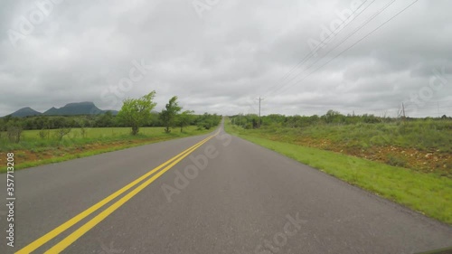 Countryside in the spring. Scenic view from car. Oklahoma, countryside. POV. Point of view countryside in the spring. Scenic view from car of beautiful green fields, trees.