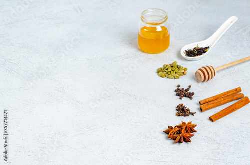 Ingredients for making indian traditional masala tea drink.