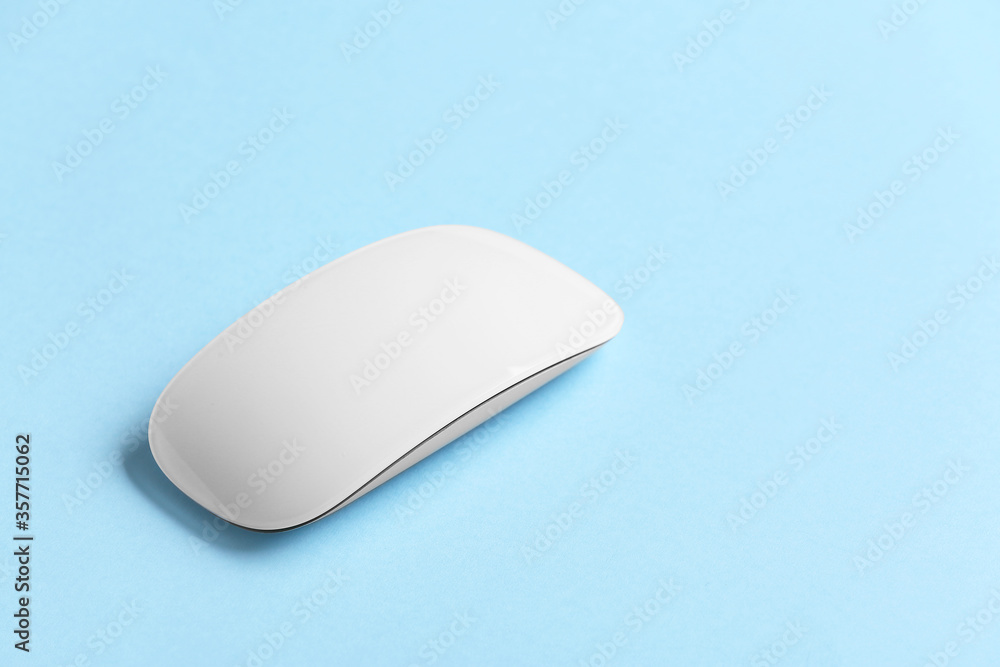 Modern computer mouse on color background Modern computer mouse on color background