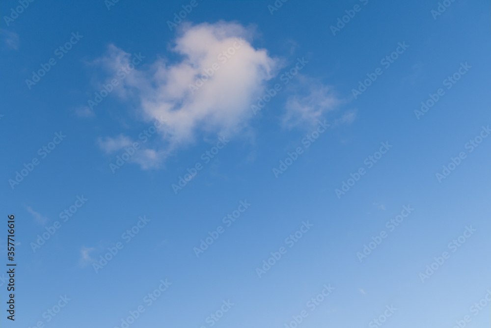 White cloud in blue sky, evening. White cloud in blue sky, evening.