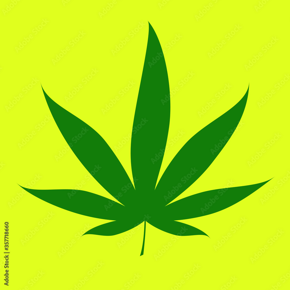 green cannabis leaf over yellow background