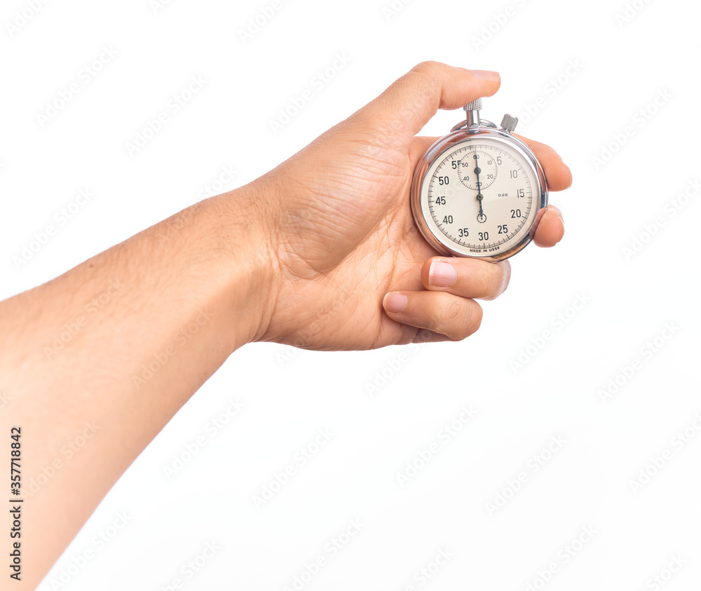 Hand of caucasian young man doing countdown holding stopwatch over isolated white background Hand of caucasian young man doing countdown holding stopwatch over isolated white background