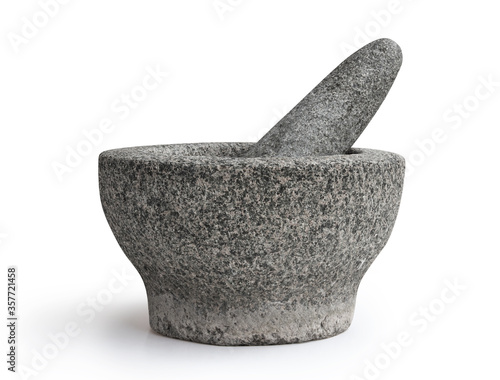 Foto Stone mortar and pestle isolated on white background