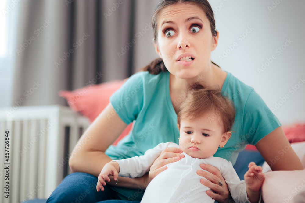 Mom Holding Active Playful Baby Girl Mom Holding Active Playful Baby Girl