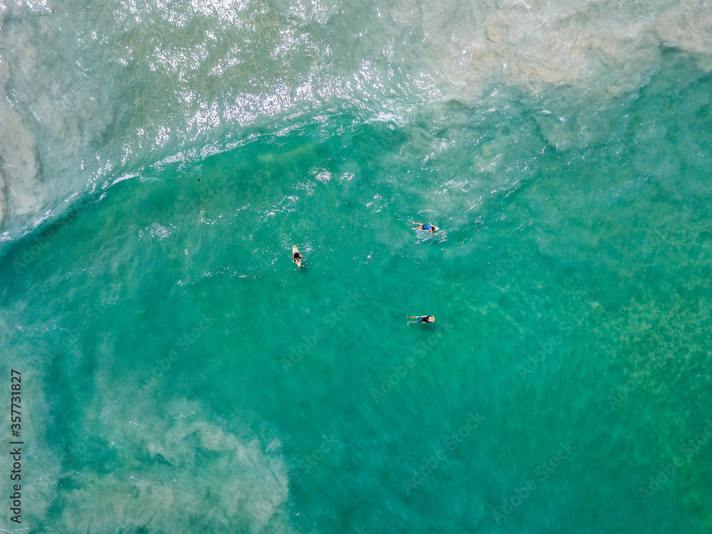 Aerial View Of Wave In Ocean And Surfers. Surfing And Waves