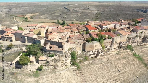 aerial view (backward dolly movement) over Rello village, province of Soria, Castilla y Leon, Spain photo