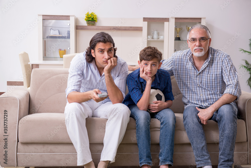 Boy and his father and his grandfother indoor Boy and his father and his grandfother indoor