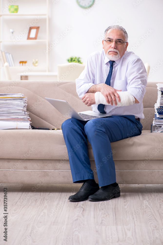 Aged businessman employee working from house Aged businessman employee working from house
