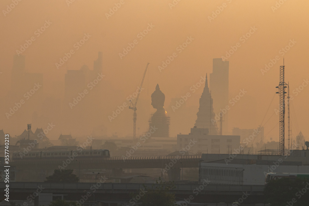 Naklejka premium sunset over the city