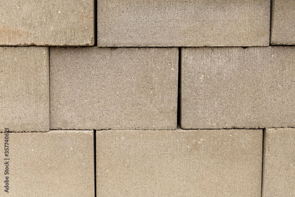 Fototapeta premium cinder blocks stacked high at a construction site
