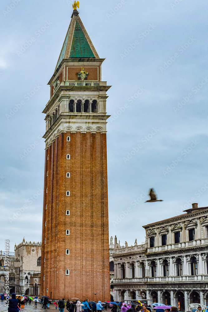 Venice, Italy. Saint Marks Campanile, the bell tower of St Marks Basilica (Church) in San Marco Square (Piazza). Popular tourist attraction and very recognizable symbol of the city.