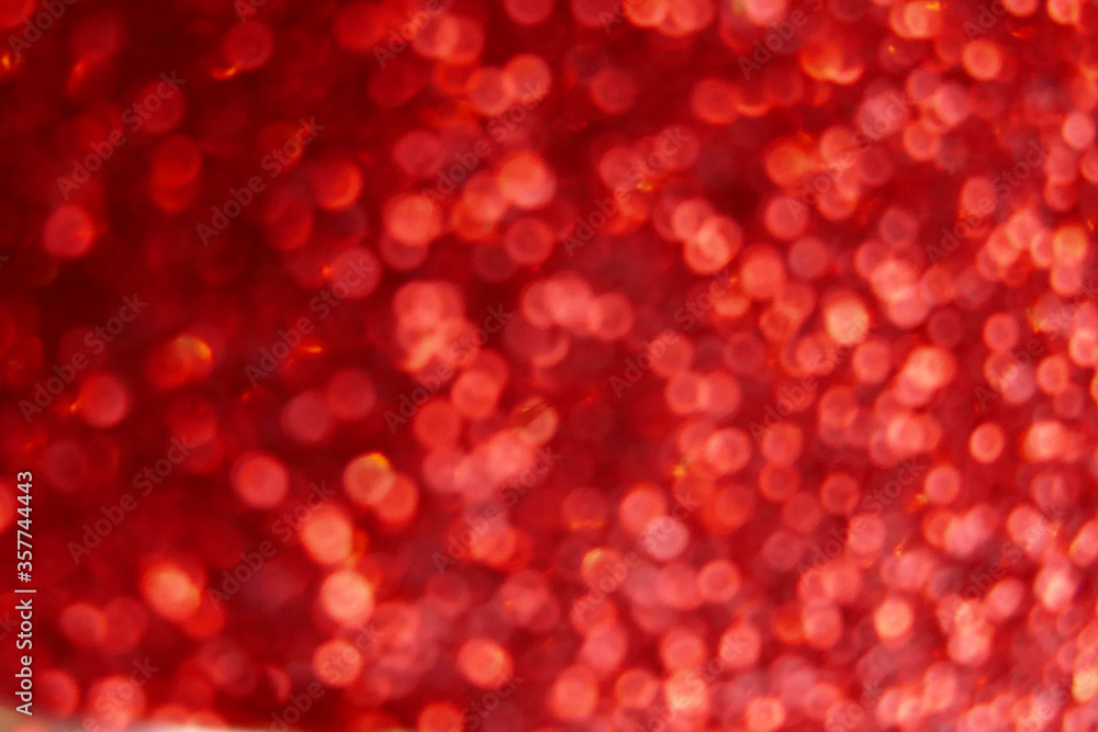 Wallpaper phone shining glitter.Red shiny blurred background. Soft focus.Shining red bokeh surface.Glitter shiny texture.Abstract bright red flickering festive background. Wallpaper phone shining glitter.Red shiny blurred background. Soft focus.Shining red bokeh surface.Glitter shiny texture.Abstract bright red flickering festive background.