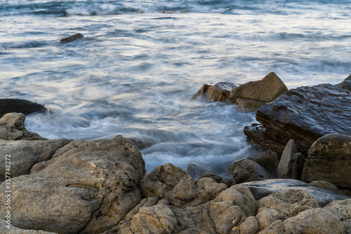 rocks in the rushing sea
