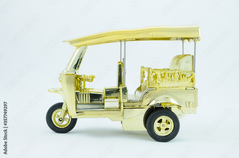 A Miniature Tuktuk on White Background