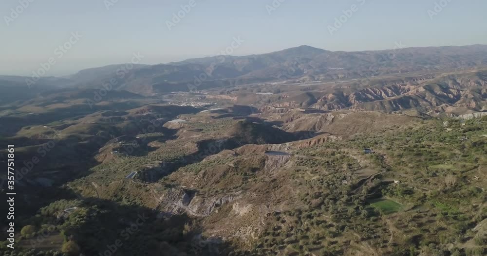 Sierra Nevada (Spain) mountain range & orchards with drone shot in 4k Sierra Nevada (Spain) mountain range & orchards with drone shot in 4k