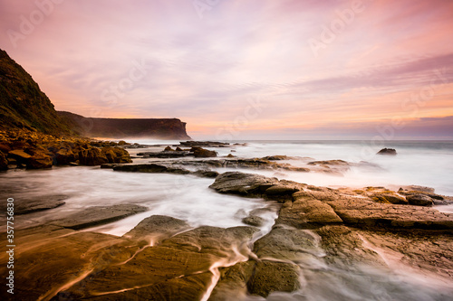 Sunset along Pacific coastline in Royal National Park of Australia