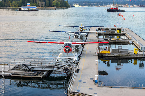 Seaplanes/ Float Planes/ Pontoon Planes docked in Coal Harbour, downtown Vancouver, British Columbia