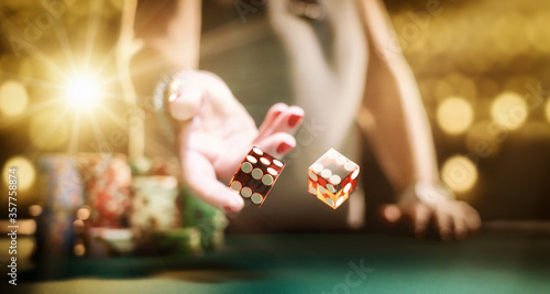 Man gambling at the craps table photo