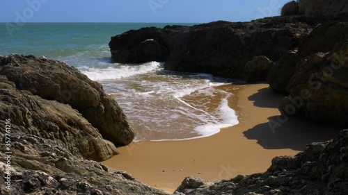 Ocean Waves In Brittas Bay Beach In County Wicklow, Ireland On A Hot Sunny Summer Day.  - static shot photo