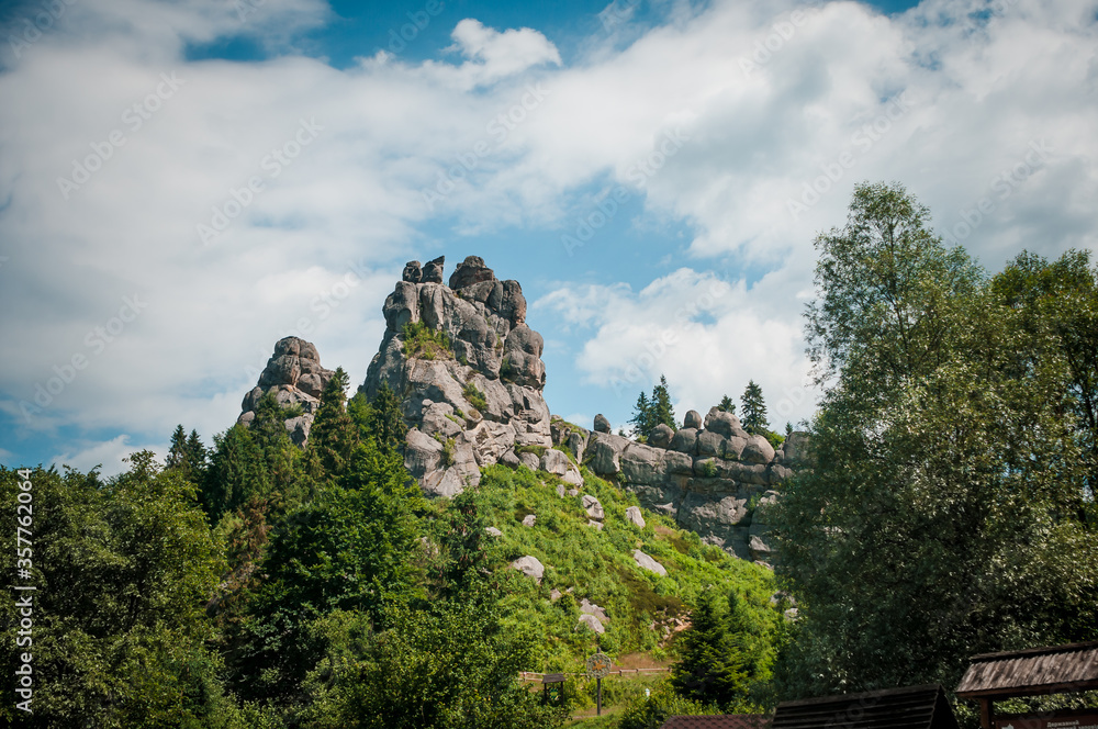 Remains of the rocks of the city of Tustan fortress in the Carpathian mountains