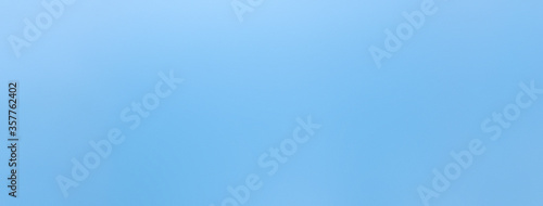 Smooth sky blue color paper banner background photo
