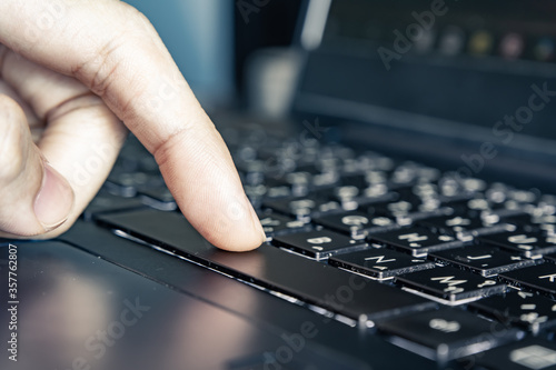 typing the spacebar on a keyboard