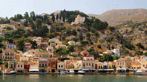 Symi town, Symi island, pictorial view of colorful houses and the harbour  © VP