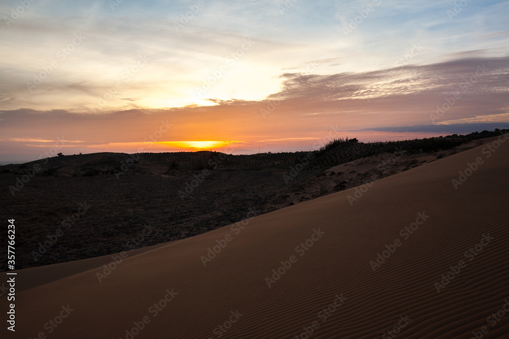 Sunset at Sand dunes in the desert, Muine, Vietnam