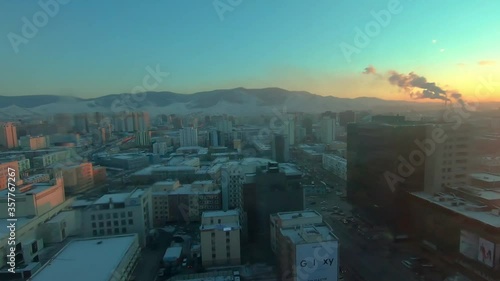 Day To Night Timelapse Of Ulaanbaatar Cityscape And Bogd Khan Uul National Park photo