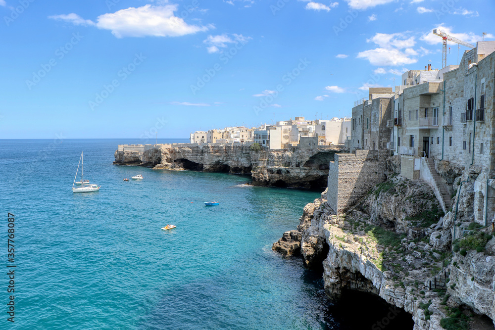 Overview of the coast and blue sea of Polignano a Mare, Puglia, Italy