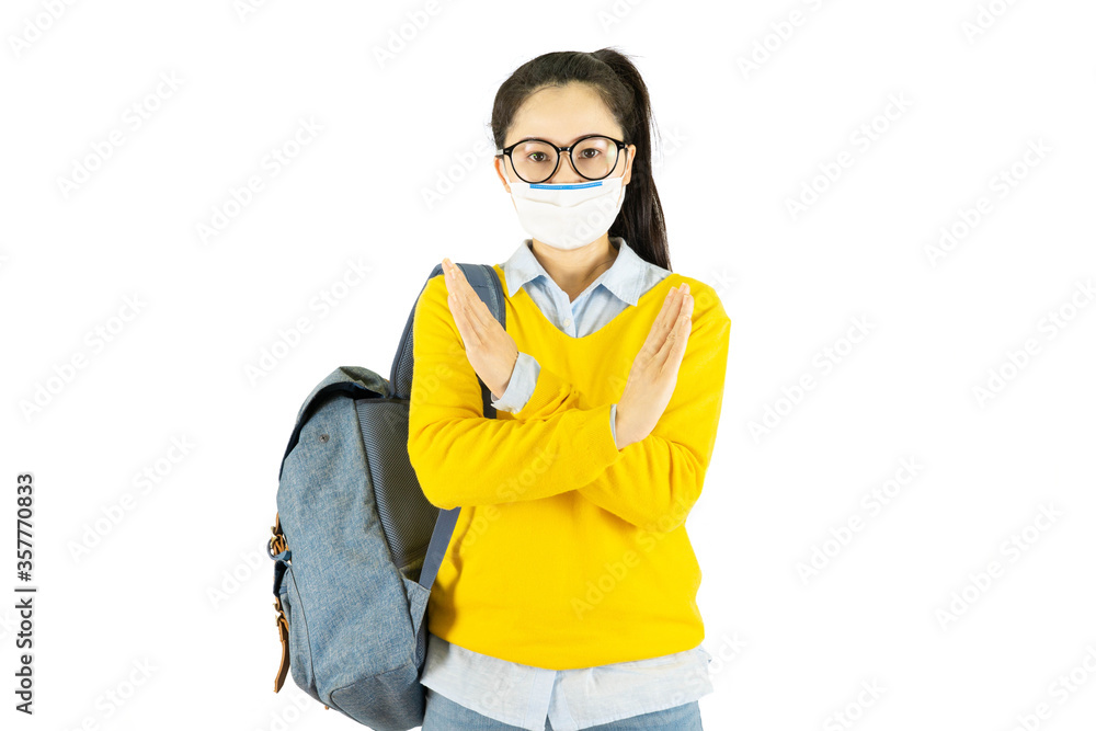 Young asian student woman in glasses wearing medical face mask,carrying a bag to go to school Under the outbreak of the virus isolated on white background Young asian student woman in glasses wearing medical face mask,carrying a bag to go to school Under the outbreak of the virus isolated on white background