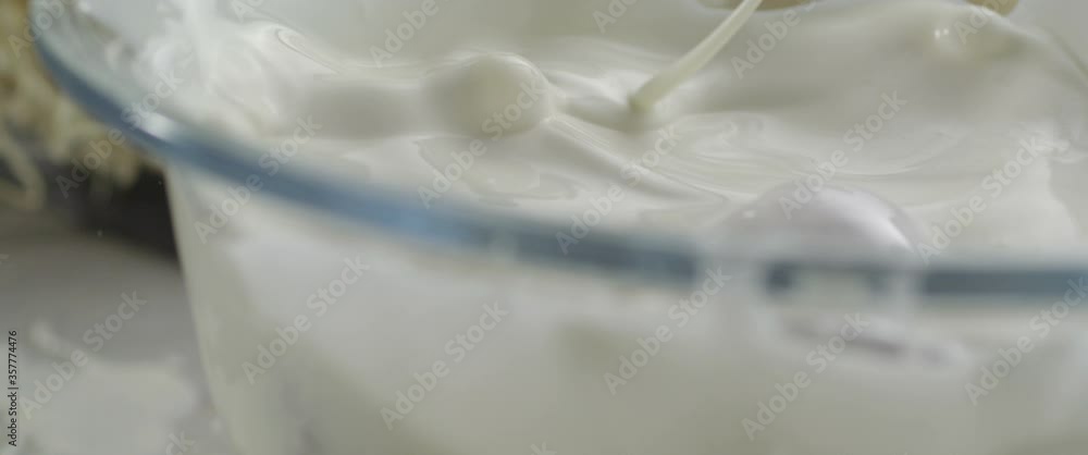 Strawberry falls into milk Slow Motion Macro Strawberry falls into milk Slow Motion Macro
