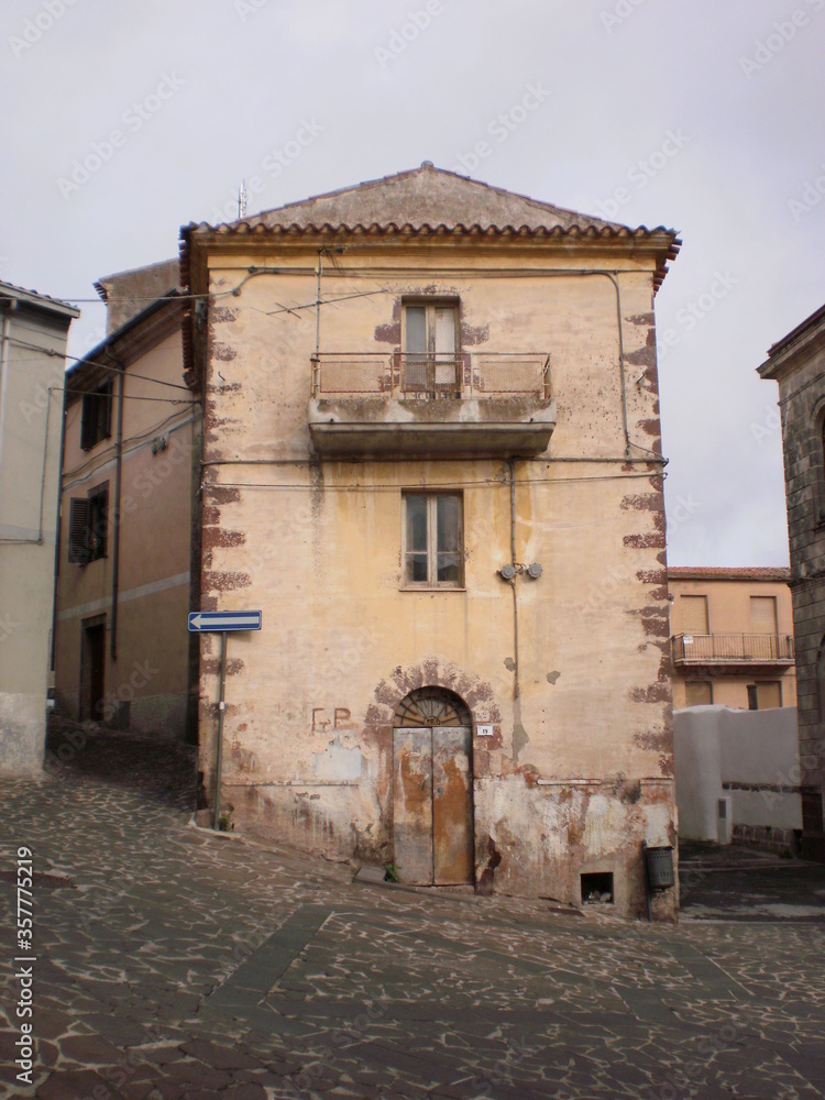 Old classic vintage building in vintage town in Sardinia, Italy, Bosa
