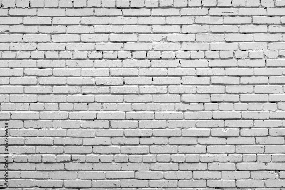 Fototapeta premium White brick wall. Facade of an old building. Architectural background.
