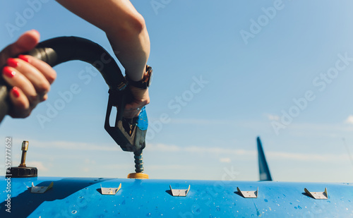 Refuel the small plain in close up. photo