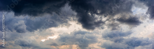 Panorama of the evening sky with storm clouds