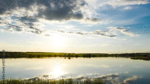 Wallpaper Mural Timelapse of white clouds over the lake in good summer weather Torontodigital.ca