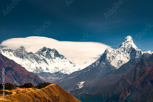View of Lhotse peak and Ama Dablam peak in Himalaya mountains. Mount Everest hidden in the clouds. Khumbu valley  Everest region  Nepal