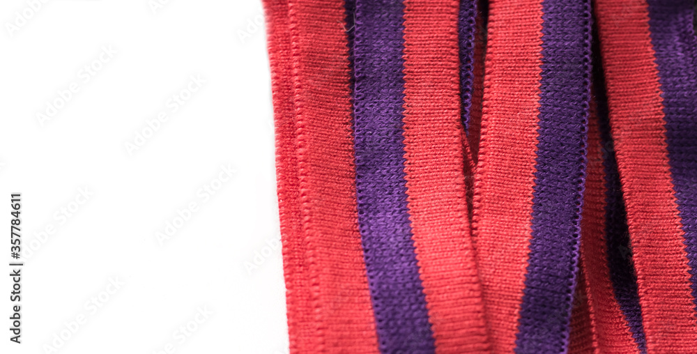knitted details in red on a white background