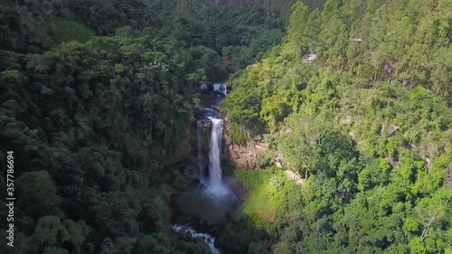 Cachoeira Engenheiro Reeve, Matilde, Alfredo Chaves, Espírito Santo, Brasil. Drone shot getting closer to the waterfall. photo