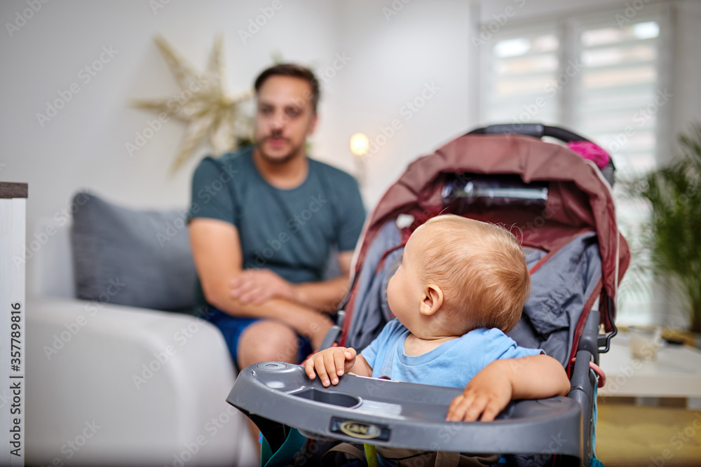 Single dad going nuts at home with a baby. Single dad going nuts at home with a baby.