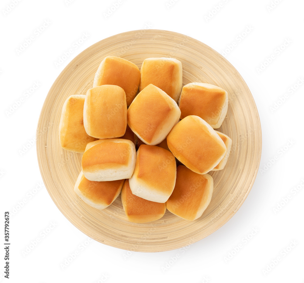 Dinner rolls on a wooden plate. Dinner rolls on a wooden plate.