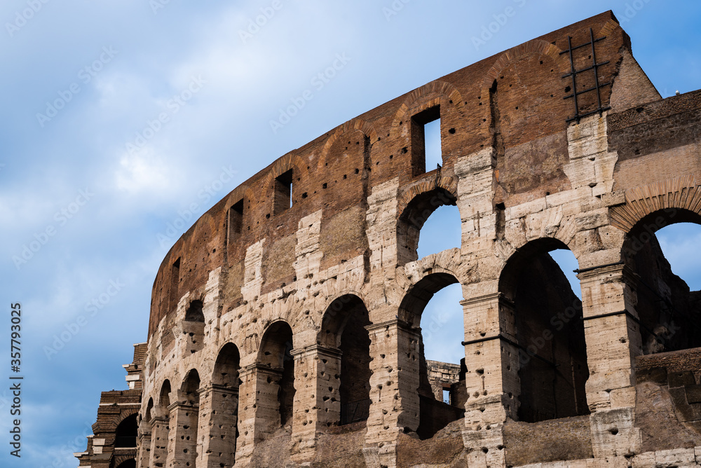 Side facade of the majestic Colosseum in Rome